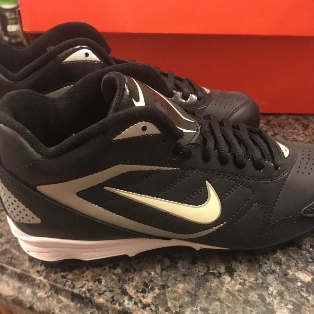 Nike gym shoes and cleats black and white